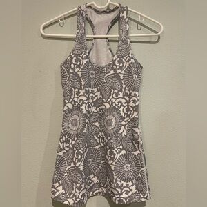 Women’s Lululemon gray and white floral razorback long tank. Size S